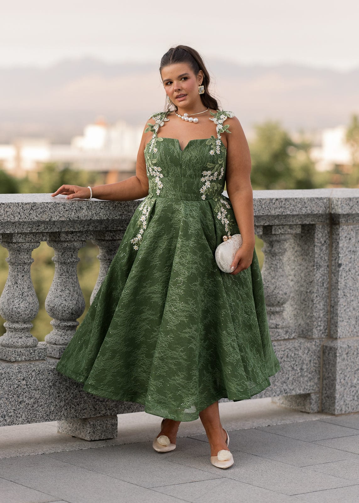 chic size inclusive model wearing JessaKae Lily Petal Dress