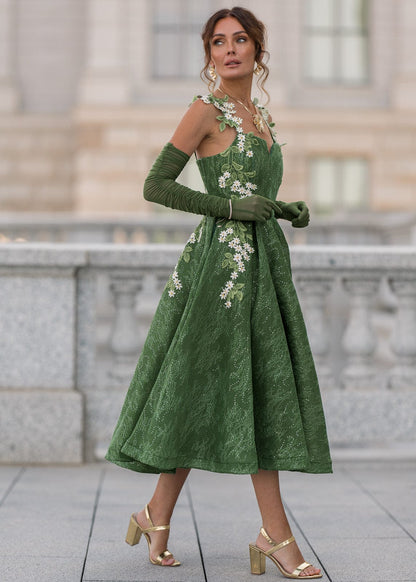 chic size inclusive model wearing JessaKae Lily Petal Dress