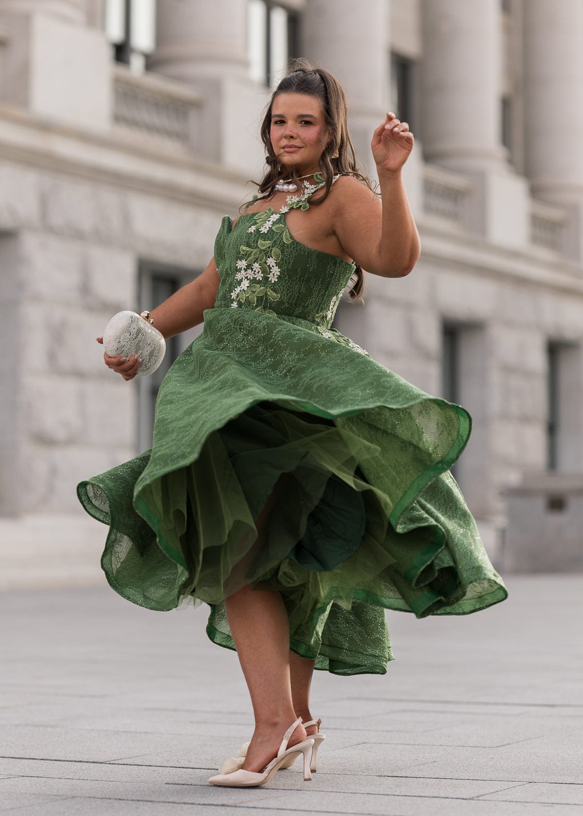 chic size inclusive model wearing JessaKae Lily Petal Dress