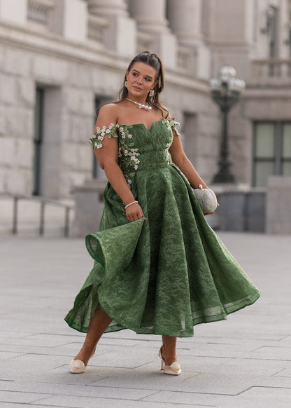 chic size inclusive model wearing JessaKae Lily Petal Dress