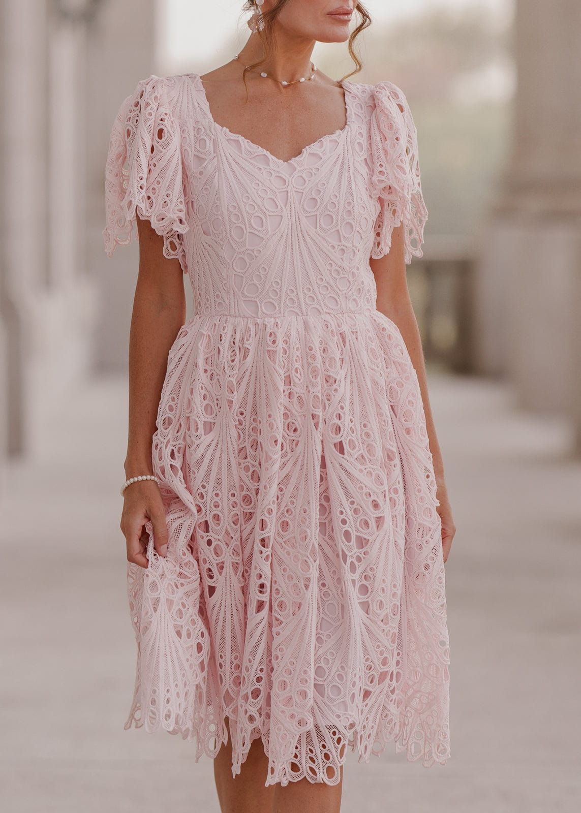 chic size inclusive model wearing JessaKae Linda Dress