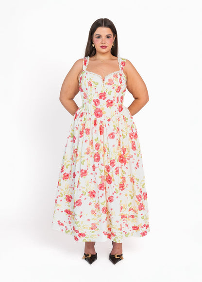 chic size inclusive model wearing JessaKae Lottie Basque Waist Floral Midi Dress - White