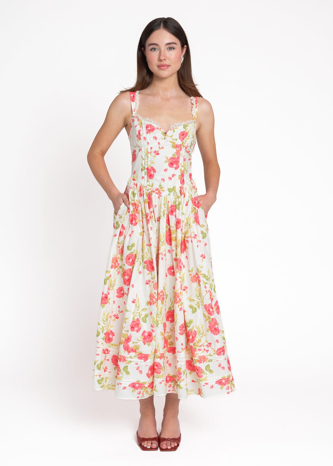 chic size inclusive model wearing JessaKae Lottie Basque Waist Floral Midi Dress - White