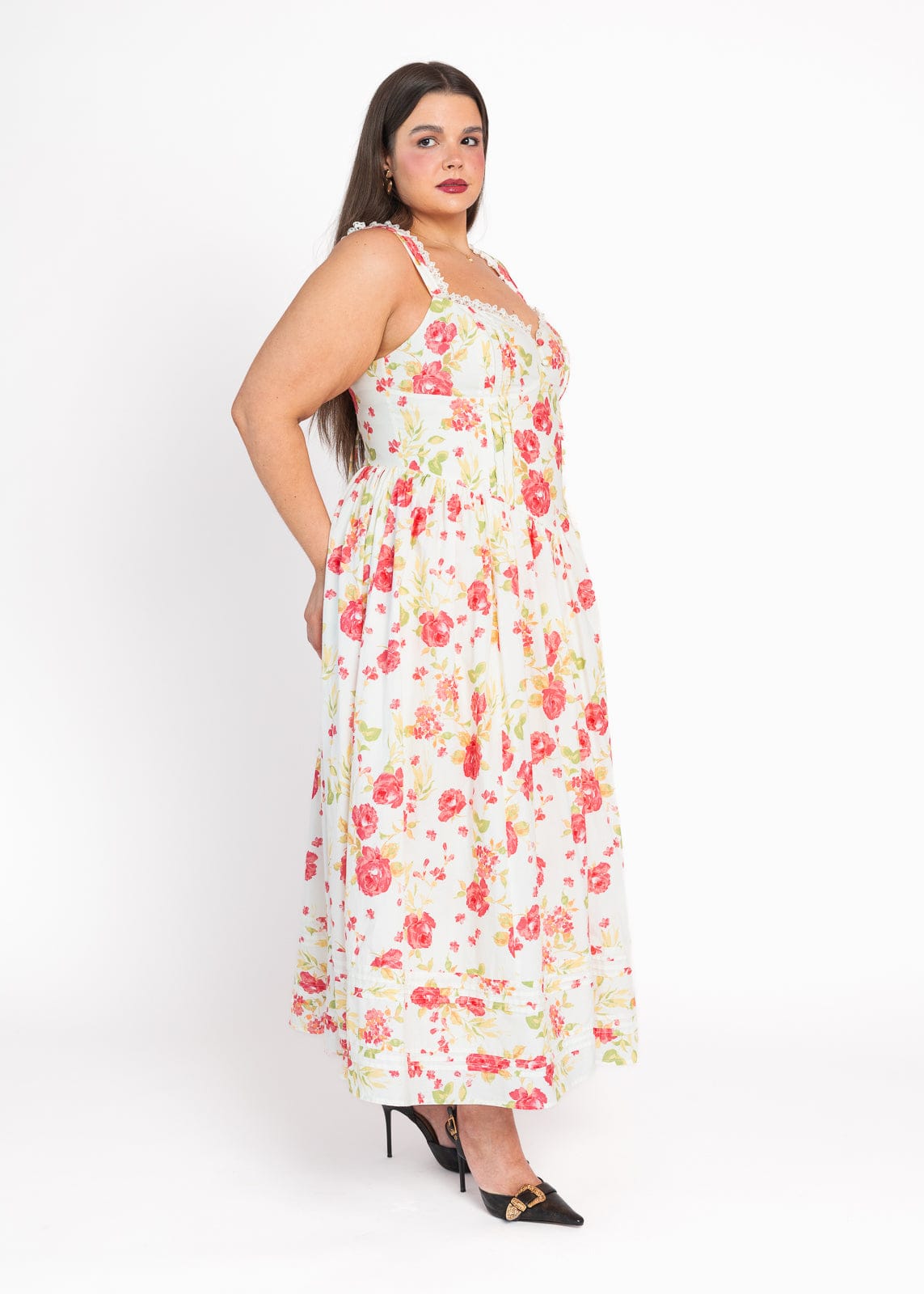 chic size inclusive model wearing JessaKae Lottie Basque Waist Floral Midi Dress - White