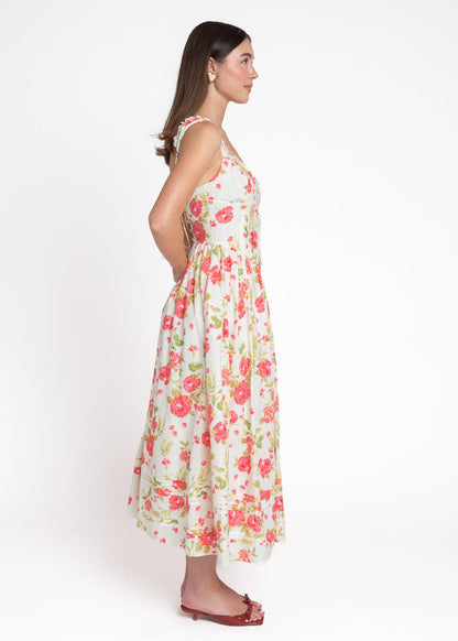 chic size inclusive model wearing JessaKae Lottie Basque Waist Floral Midi Dress - White