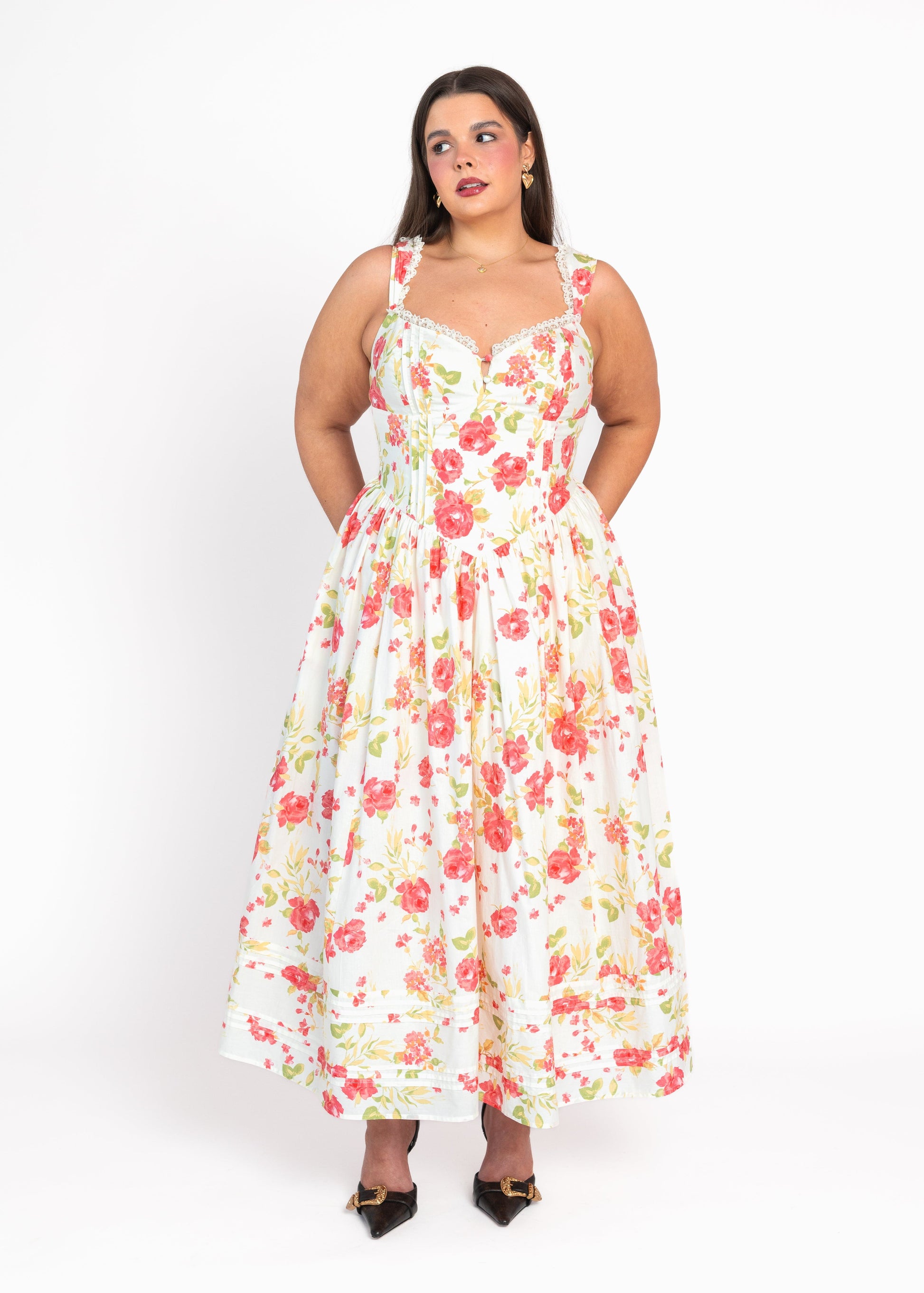 chic size inclusive model wearing JessaKae Lottie Basque Waist Floral Midi Dress - White