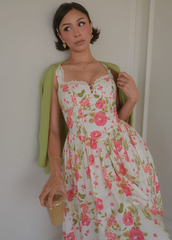 chic size inclusive model wearing JessaKae Lottie Basque Waist Floral Midi Dress - White Dresses