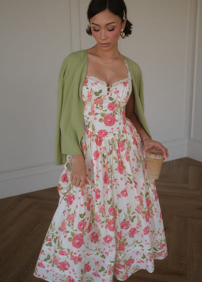 chic size inclusive model wearing JessaKae Lottie Basque Waist Floral Midi Dress - White Dresses