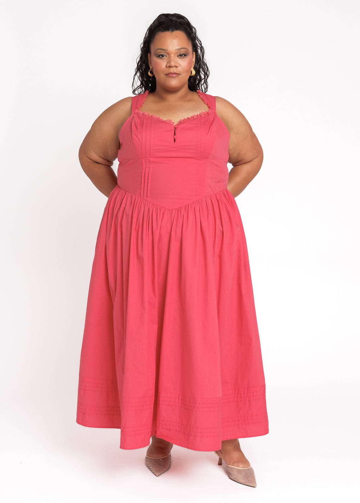 chic size inclusive model wearing JessaKae Lottie Basque Waist Midi Dress - Coral