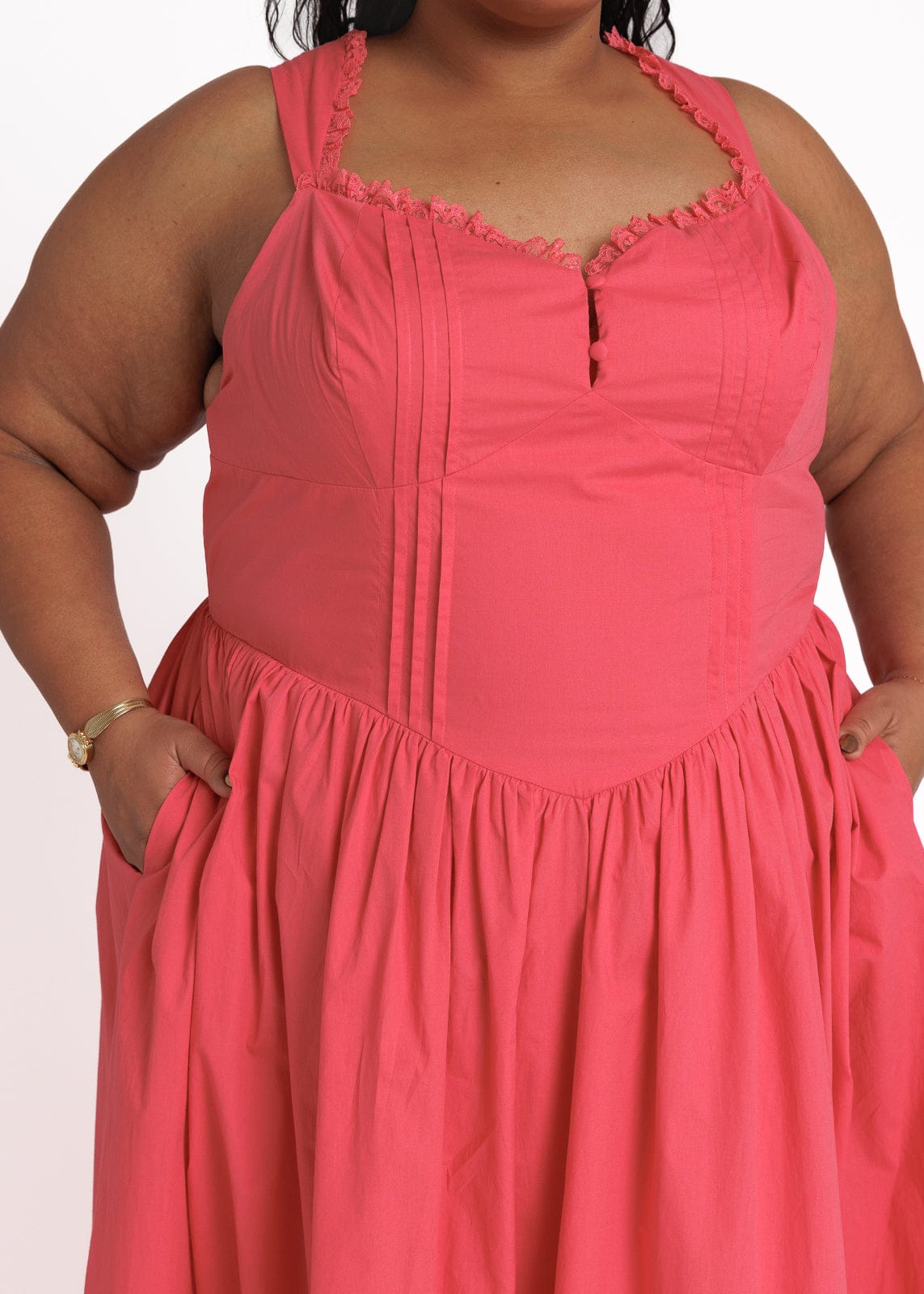 chic size inclusive model wearing JessaKae Lottie Basque Waist Midi Dress - Coral