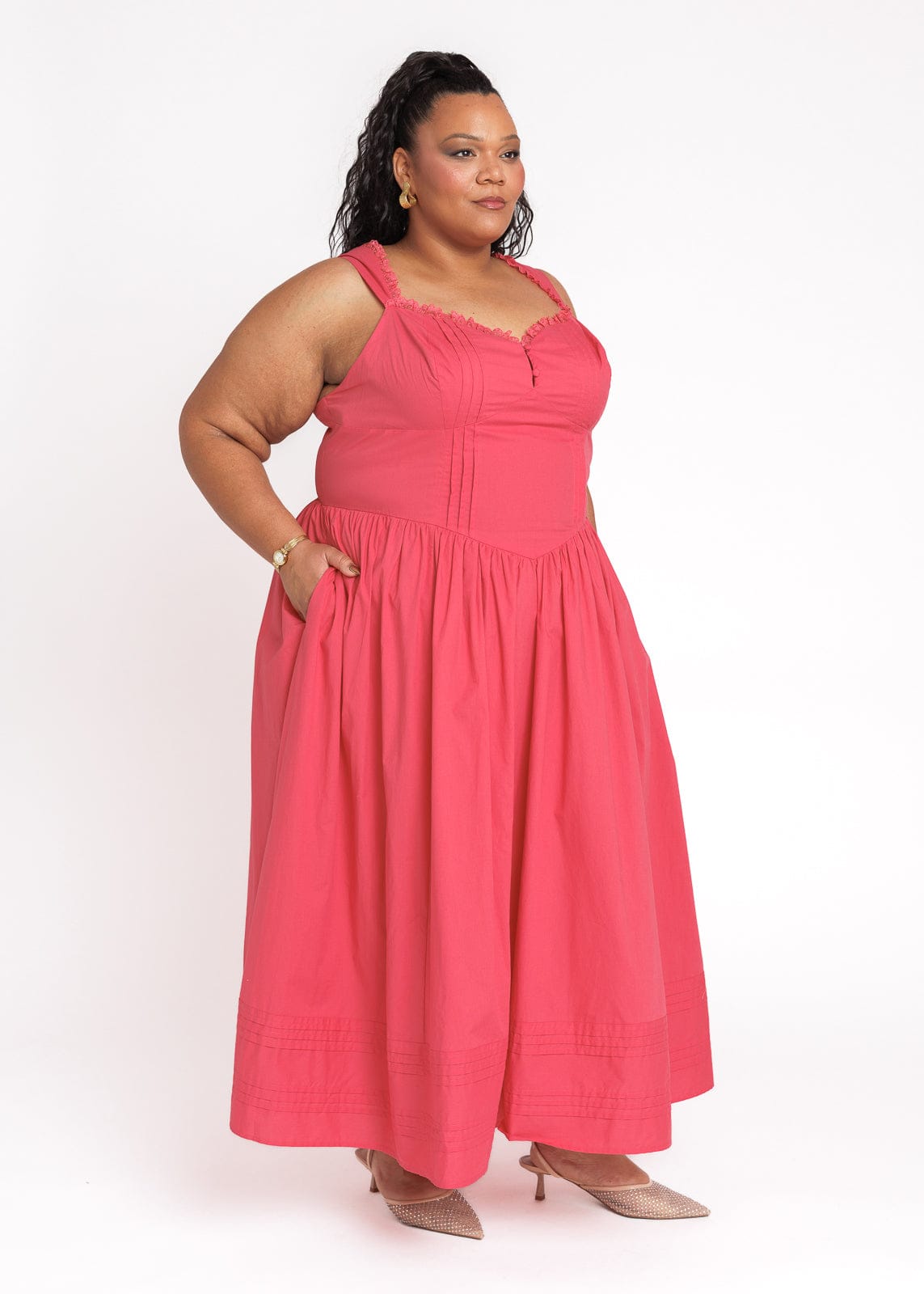 chic size inclusive model wearing JessaKae Lottie Basque Waist Midi Dress - Coral