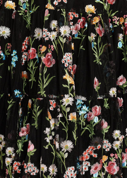 chic size inclusive model wearing JessaKae Margaret Floral Embroidered Midi Dress Black Dresses