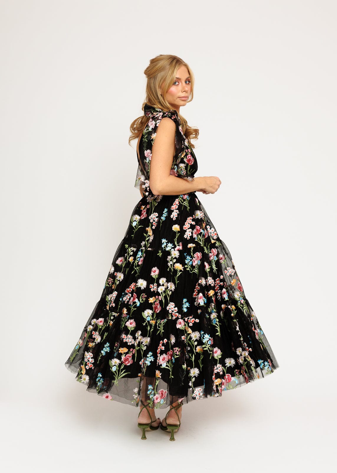 chic size inclusive model wearing JessaKae Margaret Floral Embroidered Midi Dress Black Dresses