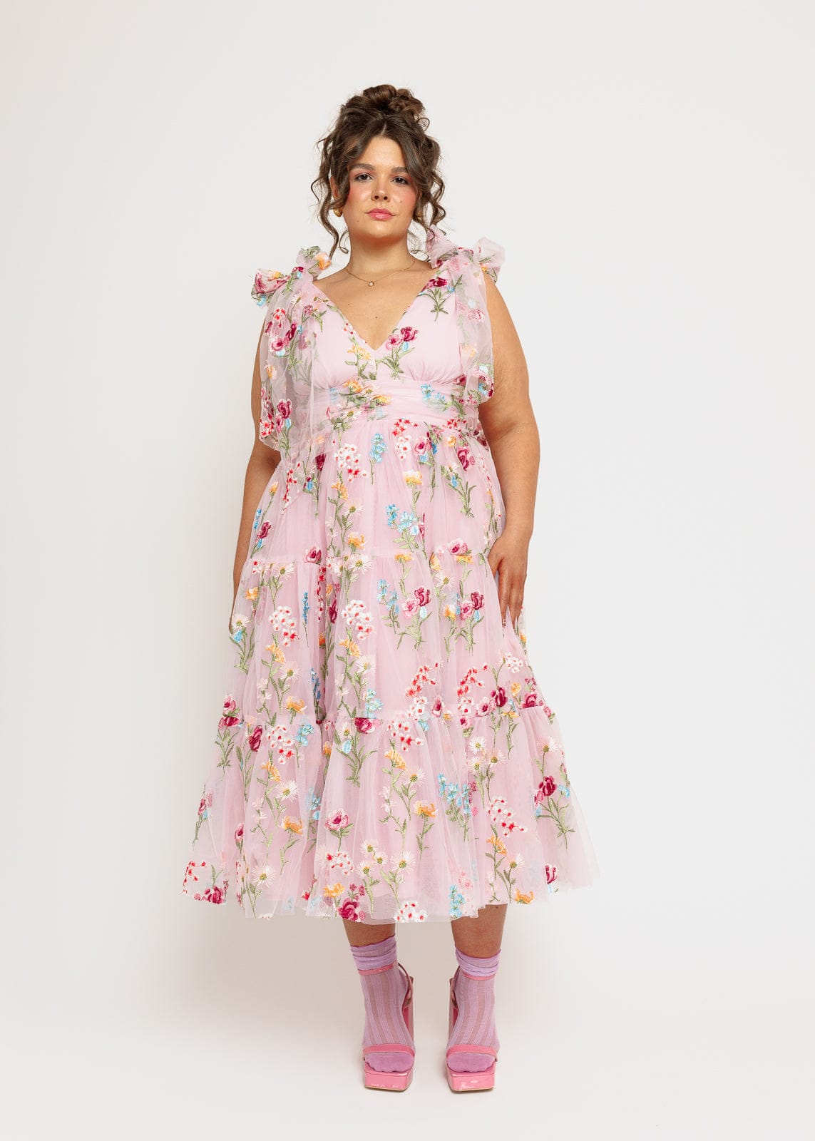 chic size inclusive model wearing JessaKae Margaret Floral Embroidered Midi Dress Pink Dresses