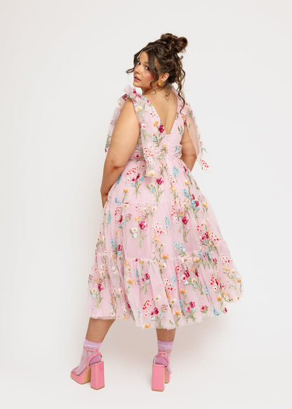 chic size inclusive model wearing JessaKae Margaret Floral Embroidered Midi Dress Pink Dresses