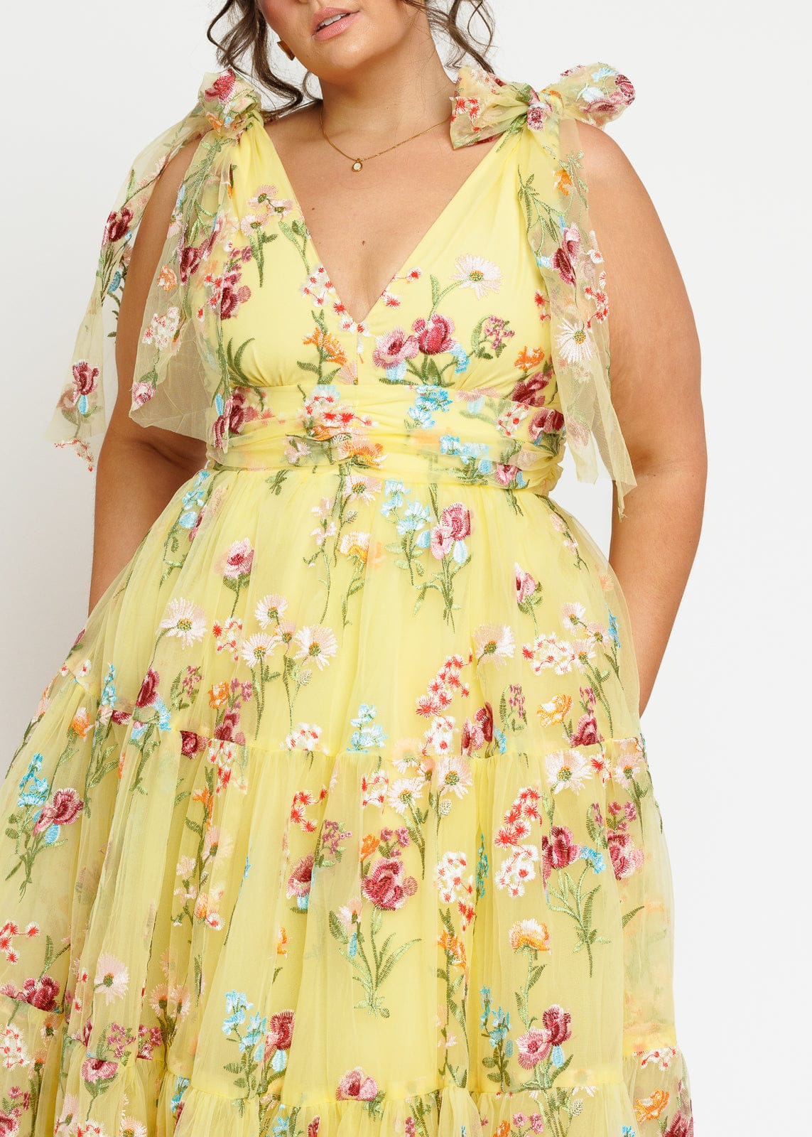 chic size inclusive model wearing JessaKae Margaret Floral Embroidered Midi Dress Yellow Dresses
