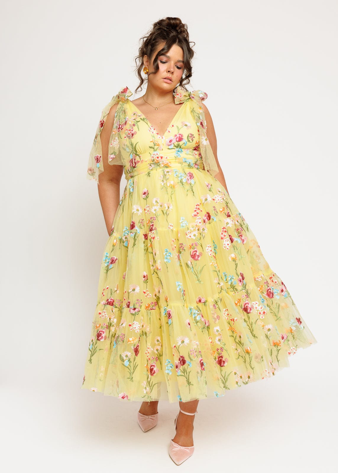 chic size inclusive model wearing JessaKae Margaret Floral Embroidered Midi Dress Yellow Dresses