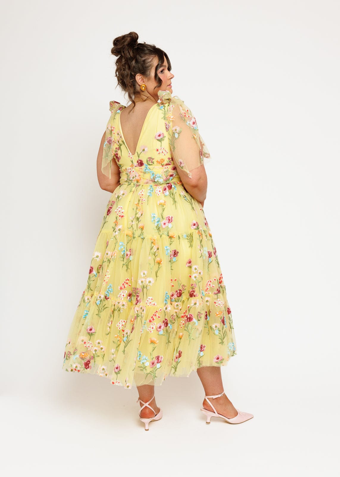 chic size inclusive model wearing JessaKae Margaret Floral Embroidered Midi Dress Yellow Dresses