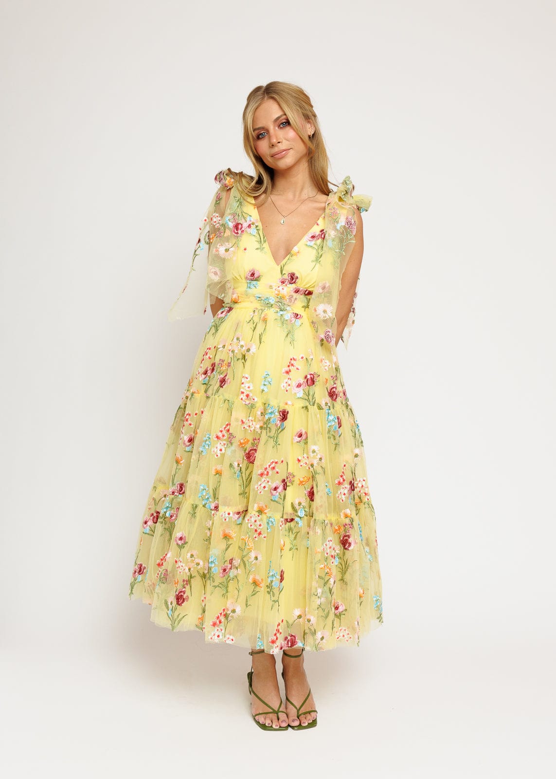 chic size inclusive model wearing JessaKae Margaret Floral Embroidered Midi Dress Yellow Dresses