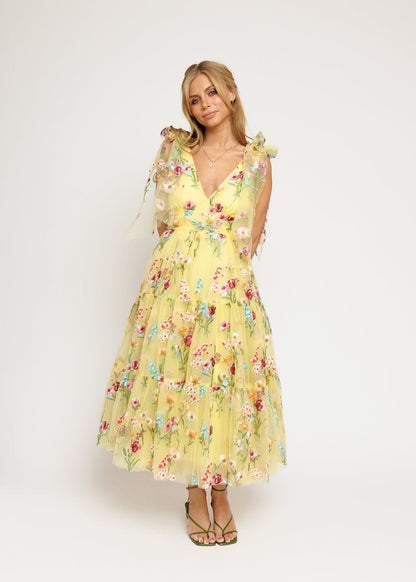 chic size inclusive model wearing JessaKae Margaret Floral Embroidered Midi Dress Yellow Dresses