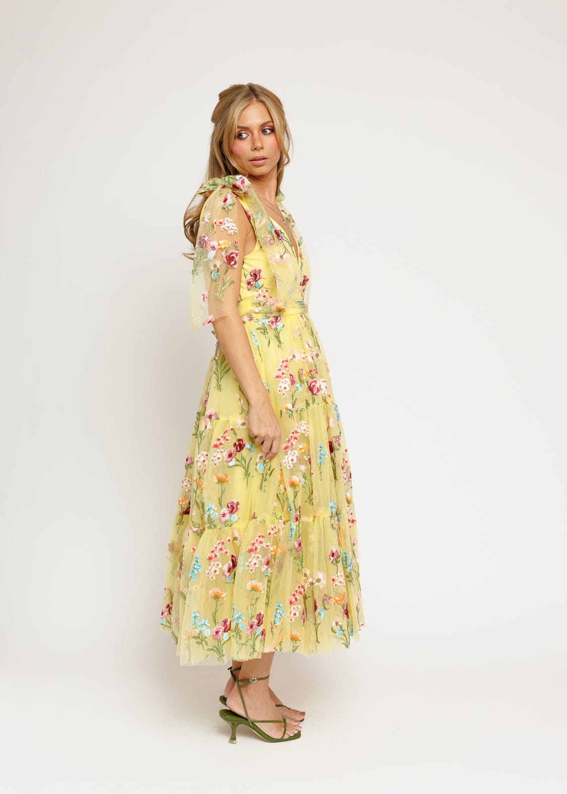 chic size inclusive model wearing JessaKae Margaret Floral Embroidered Midi Dress Yellow Dresses