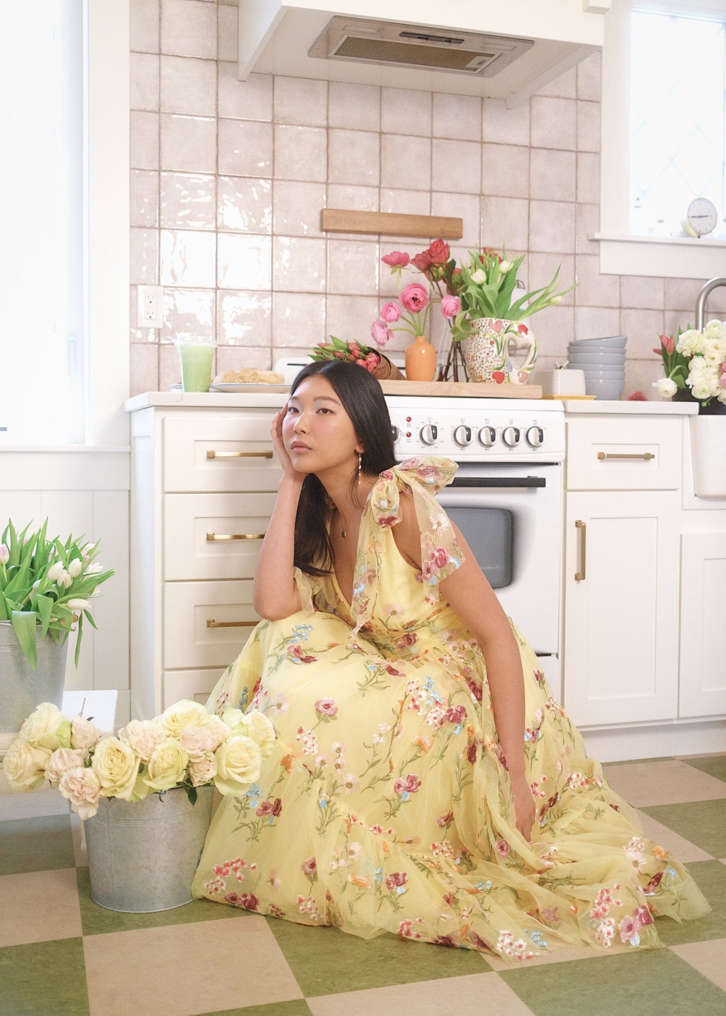 chic size inclusive model wearing JessaKae Margaret Floral Embroidered Midi Dress Yellow Dresses