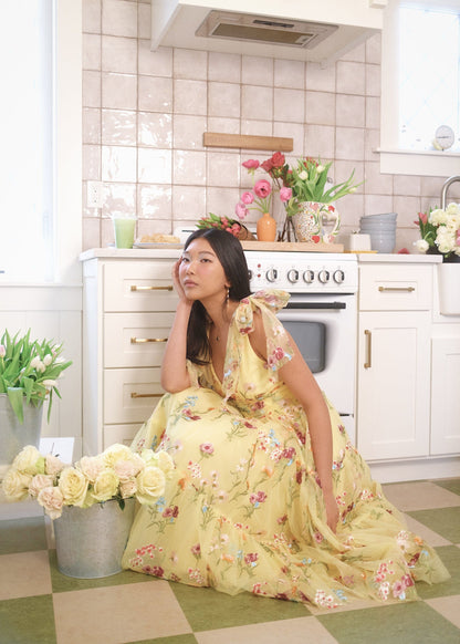 chic size inclusive model wearing JessaKae Margaret Floral Embroidered Midi Dress Yellow Dresses