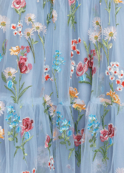 chic size inclusive model wearing JessaKae Margaret Floral Midi Dress Blue Dresses