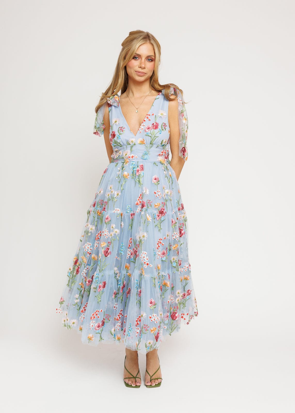chic size inclusive model wearing JessaKae Margaret Floral Midi Dress Blue Dresses
