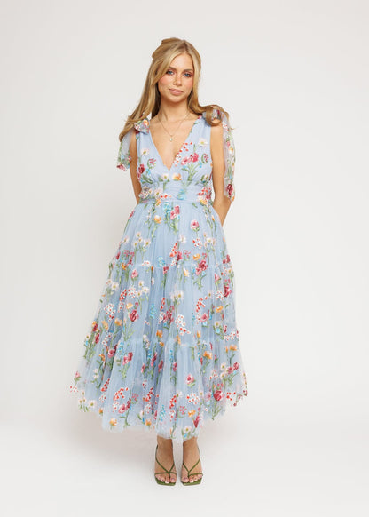 chic size inclusive model wearing JessaKae Margaret Floral Midi Dress Blue Dresses
