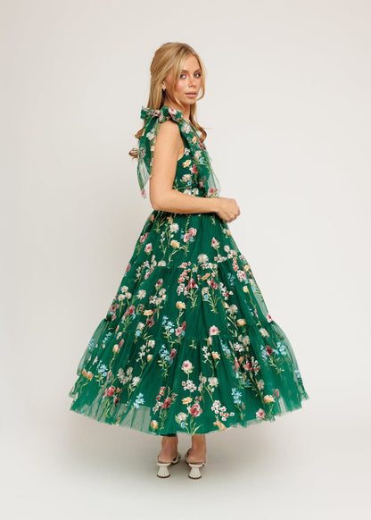 chic size inclusive model wearing JessaKae Margaret Floral Midi Dress Emerald Dresses