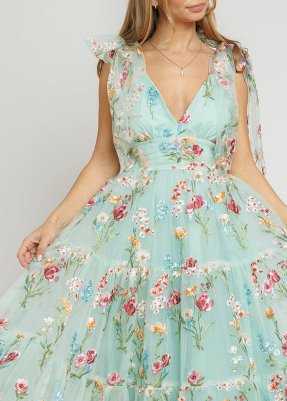 chic size inclusive model wearing JessaKae Margaret Floral Midi Dress Green Dresses