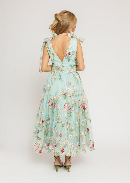 chic size inclusive model wearing JessaKae Margaret Floral Midi Dress Green Dresses