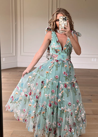 chic size inclusive model wearing JessaKae Margaret Floral Midi Dress Green Dresses