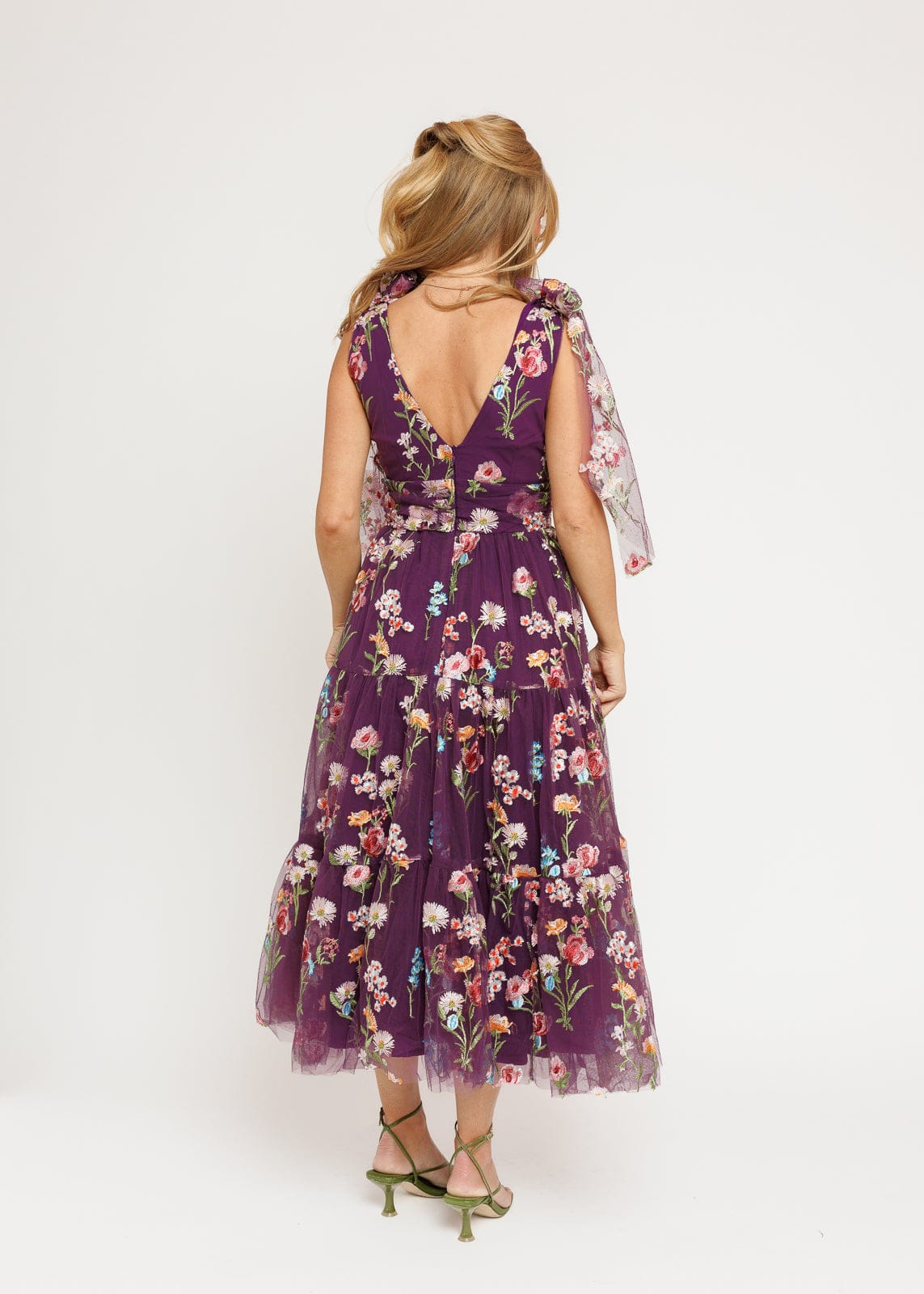 chic size inclusive model wearing JessaKae Margaret Floral Midi Dress Purple Dresses