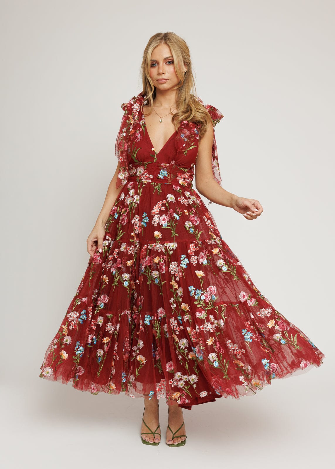 chic size inclusive model wearing JessaKae Margaret Floral Midi Dress Red Dresses