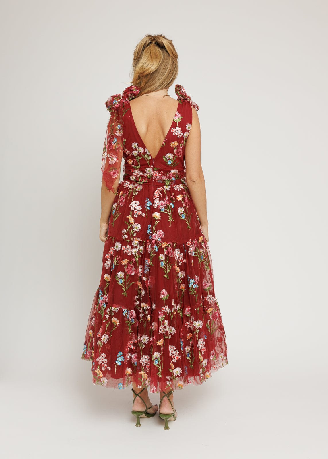 chic size inclusive model wearing JessaKae Margaret Floral Midi Dress Red Dresses