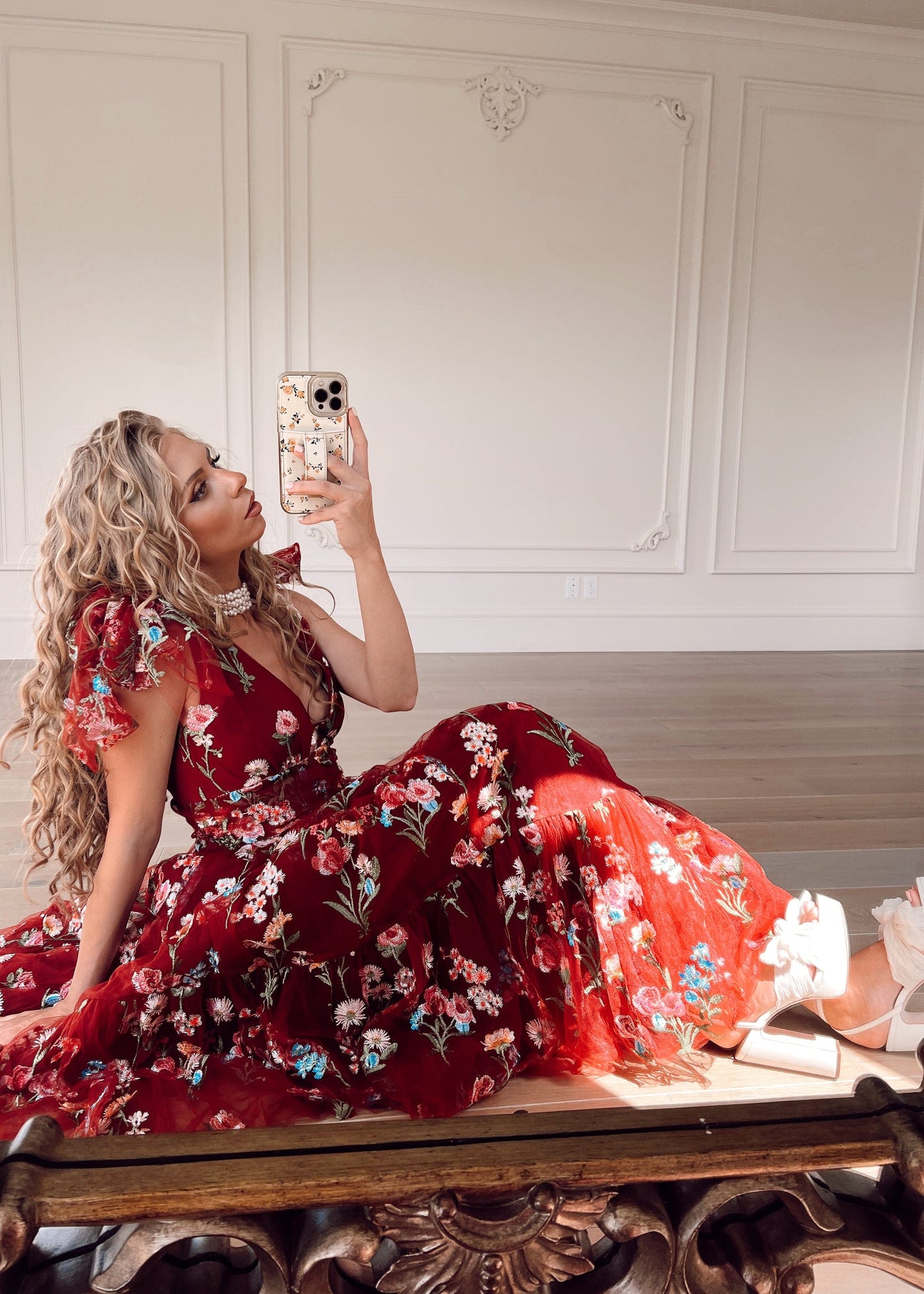 chic size inclusive model wearing JessaKae Margaret Floral Midi Dress Red Dresses