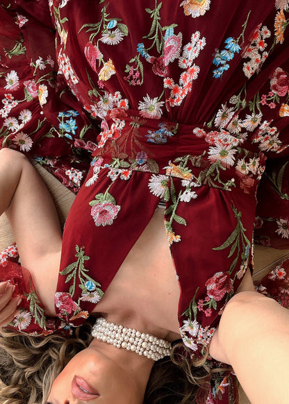 chic size inclusive model wearing JessaKae Margaret Floral Midi Dress Red Dresses