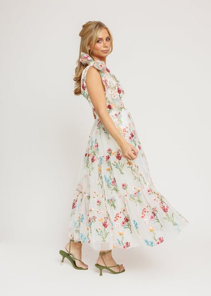 chic size inclusive model wearing JessaKae Margaret Floral Midi Dress White Dresses