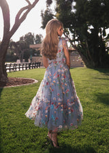 chic size inclusive model wearing JessaKae Margaret Midi Dress Dresses_Blue Floral 