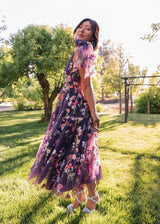 chic size inclusive model wearing JessaKae Margaret Midi Dress Dresses_Purple Floral / M Dresses