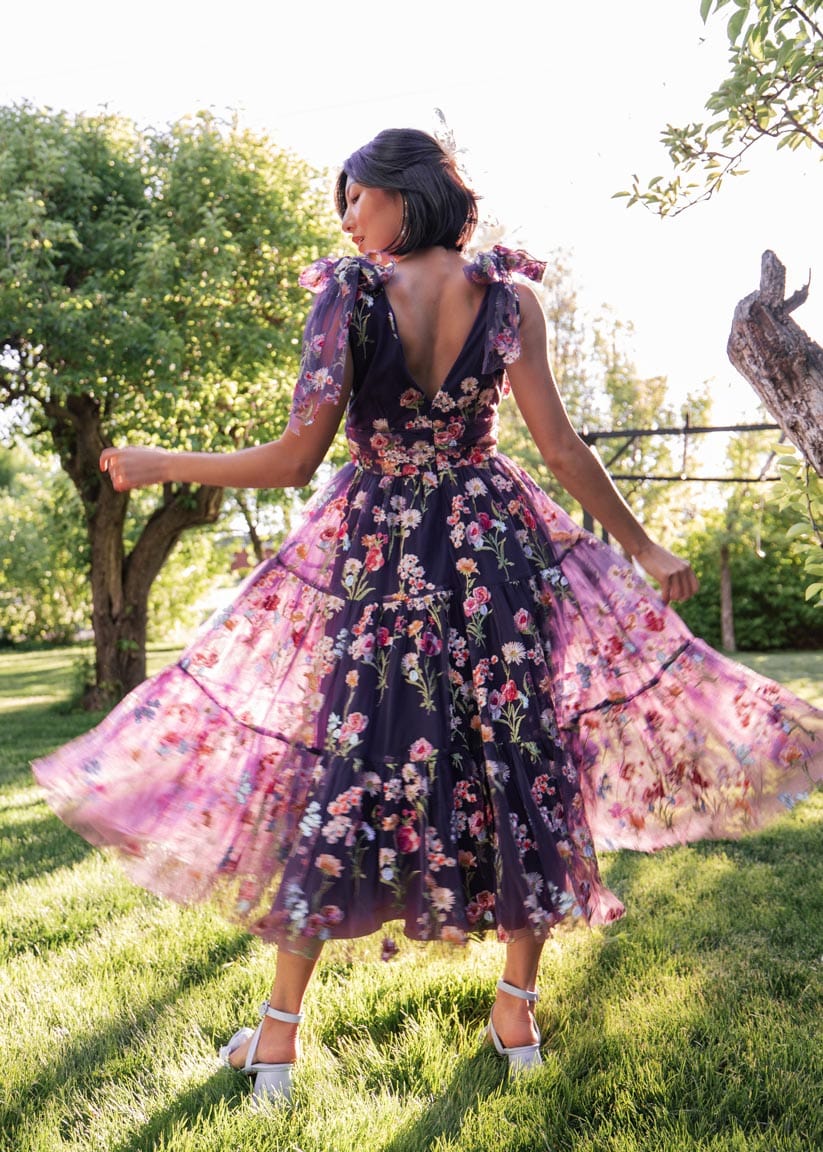 chic size inclusive model wearing JessaKae Margaret Midi Dress Dresses_Purple Floral