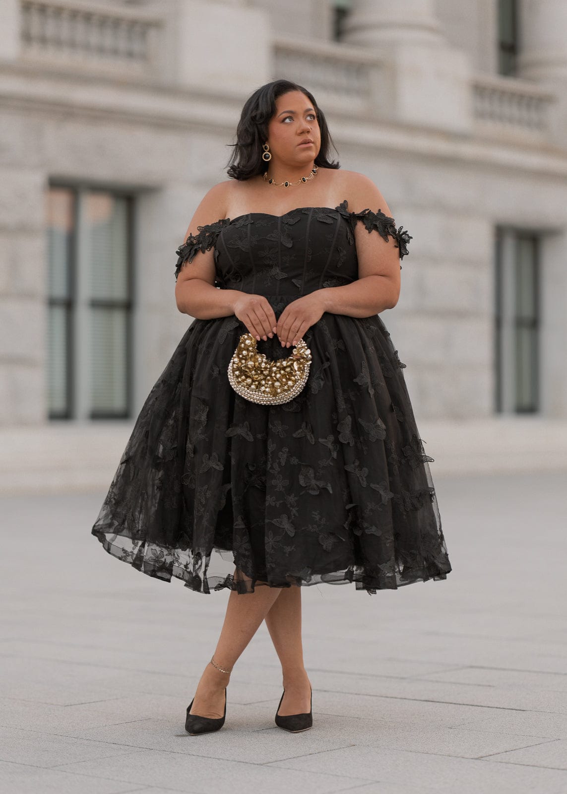 chic size inclusive model wearing JessaKae Mariposa Dress