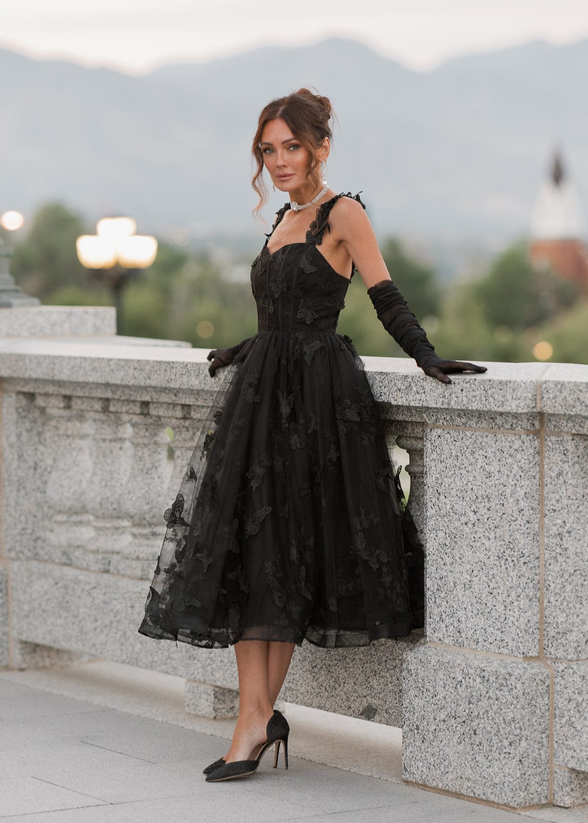 chic size inclusive model wearing JessaKae Mariposa Dress