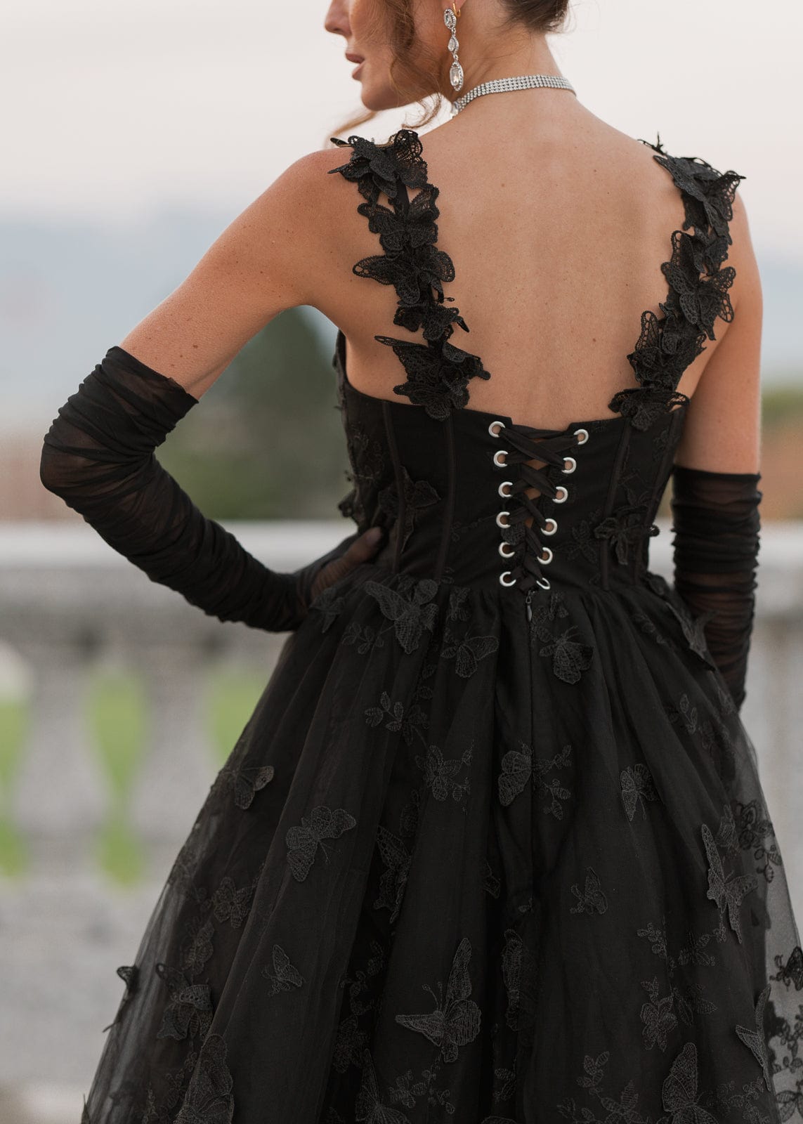 chic size inclusive model wearing JessaKae Mariposa Dress