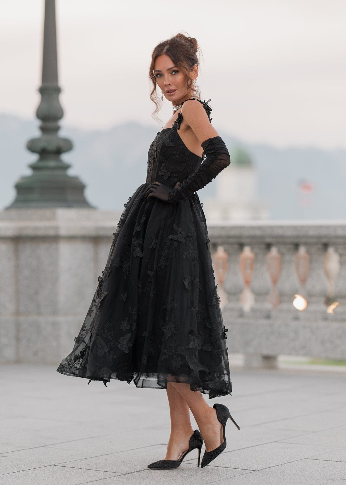 chic size inclusive model wearing JessaKae Mariposa Dress