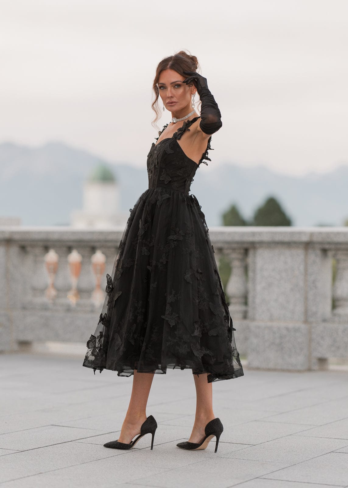 chic size inclusive model wearing JessaKae Mariposa Dress