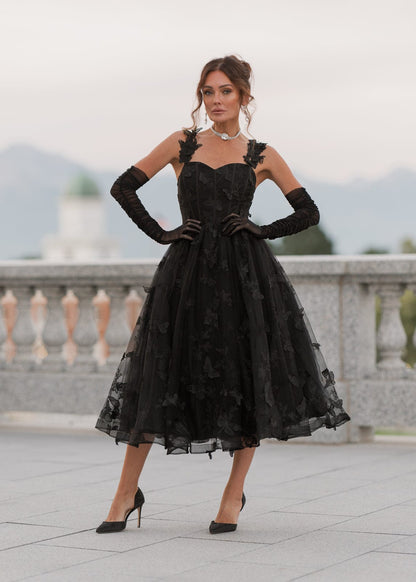 chic size inclusive model wearing JessaKae Mariposa Dress