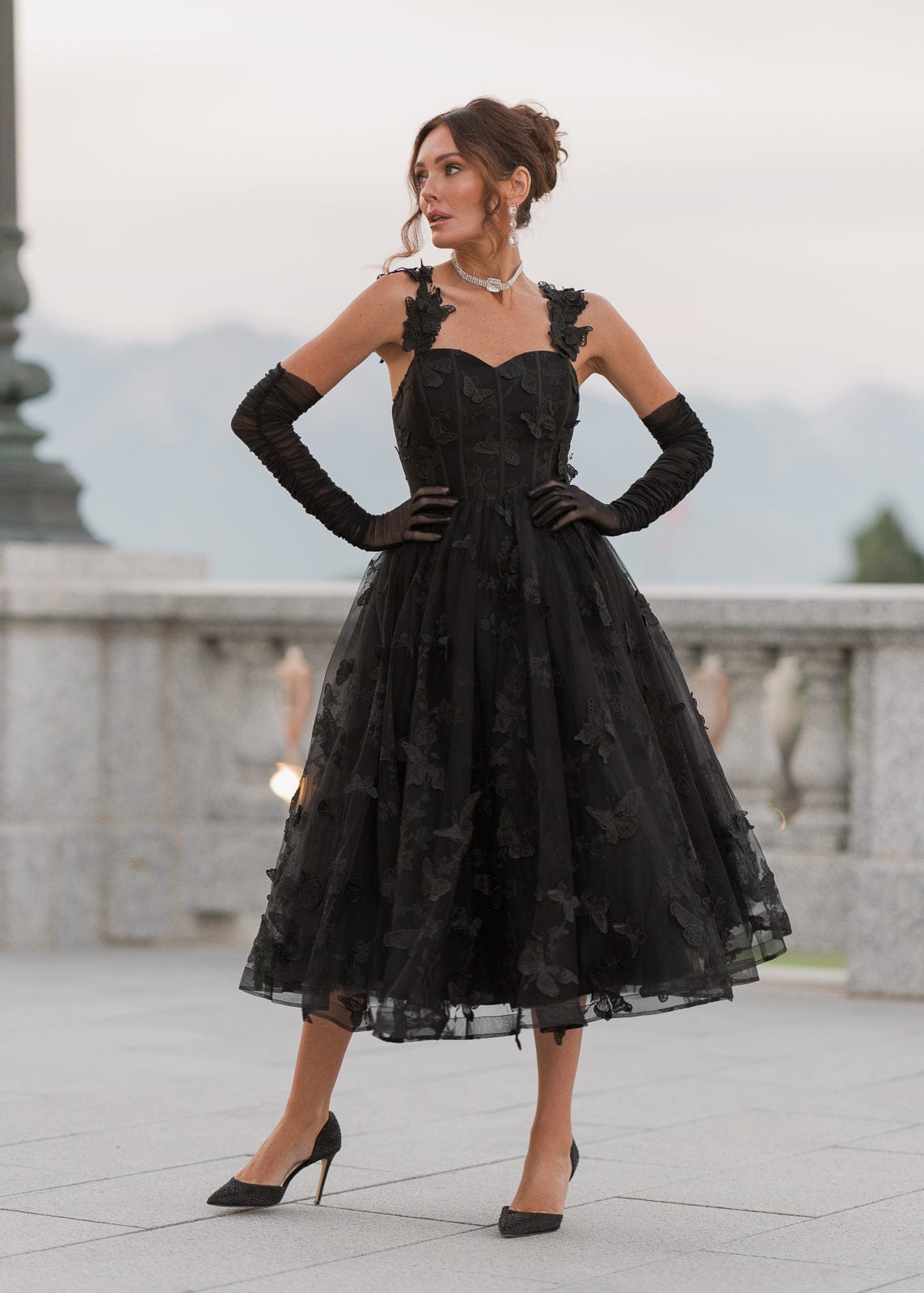 chic size inclusive model wearing JessaKae Mariposa Dress